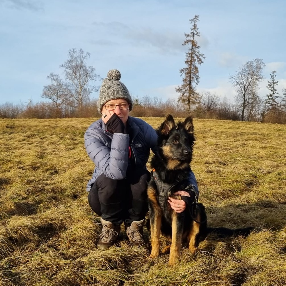 Ivana Tačíková outdoors with her dog